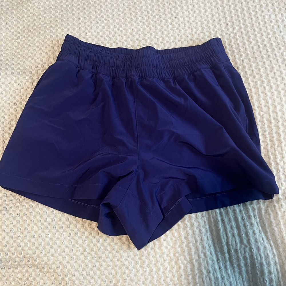 Athleta Blue Athletic Shorts with High-Waisted Design and Relaxed Fit